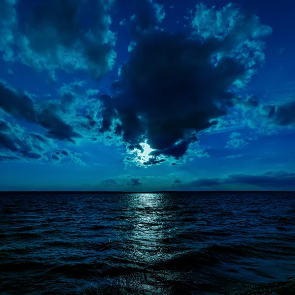 Moon light over dark water — Stock Photo, Image