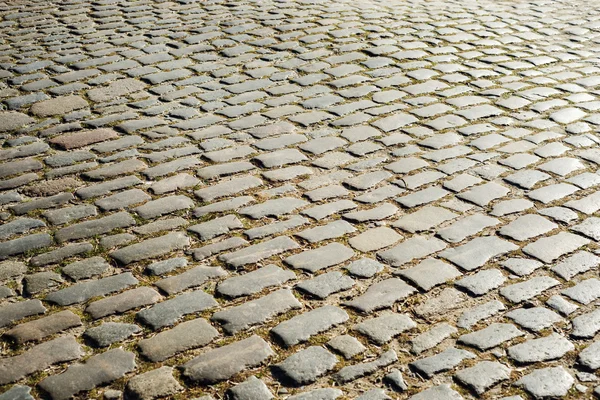 Cobblestone closeup as background — Stock Photo, Image