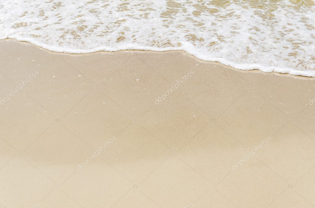 white foam on beach