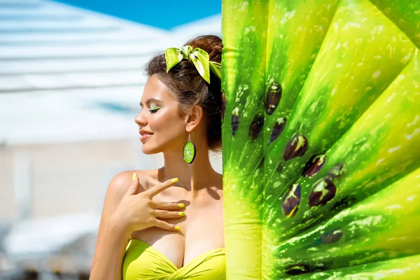 Beautiful Hippie Girl Portrait Green Earring Inflatable Kiwi Fruit Pool — Stock Photo, Image