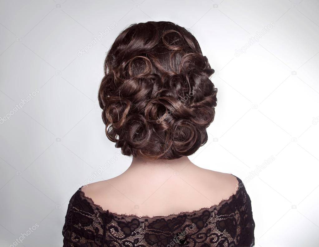Beauty wedding hairstyle. Bride. Brunette girl with curly hair s