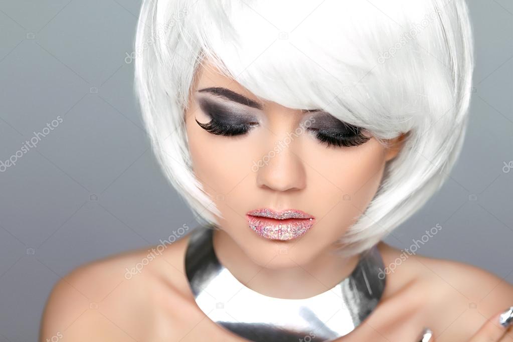 Makeup. Blond hairstyle. Fashion beauty girl model with white sh