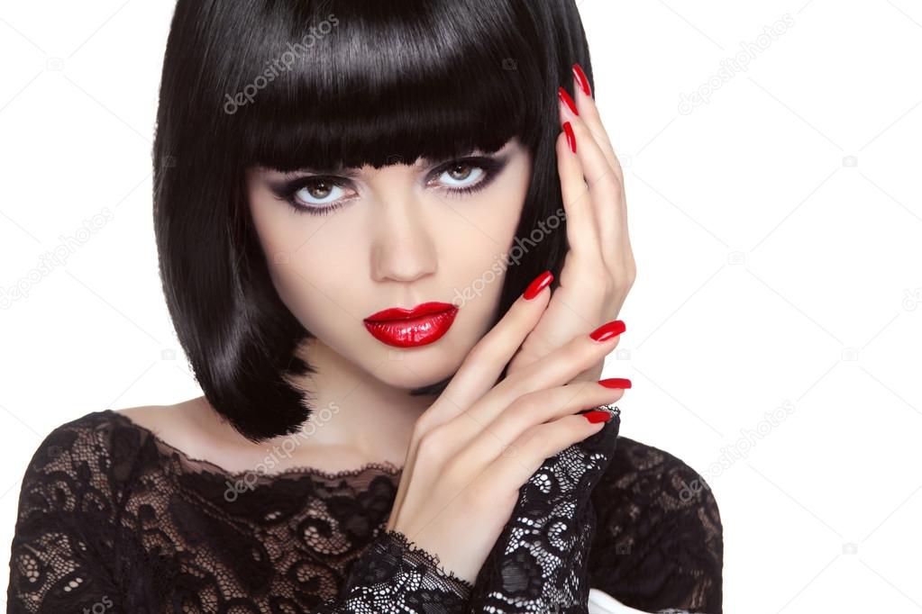 Makeup. Manicured nails. Beauty girl portrait. Red lips. Back sh