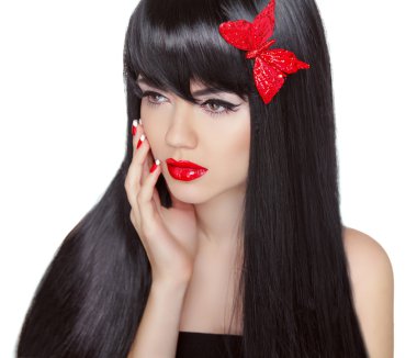 Uzun dalgalı Parlatıcı saç. Manikür nai ile çekici esmer kız