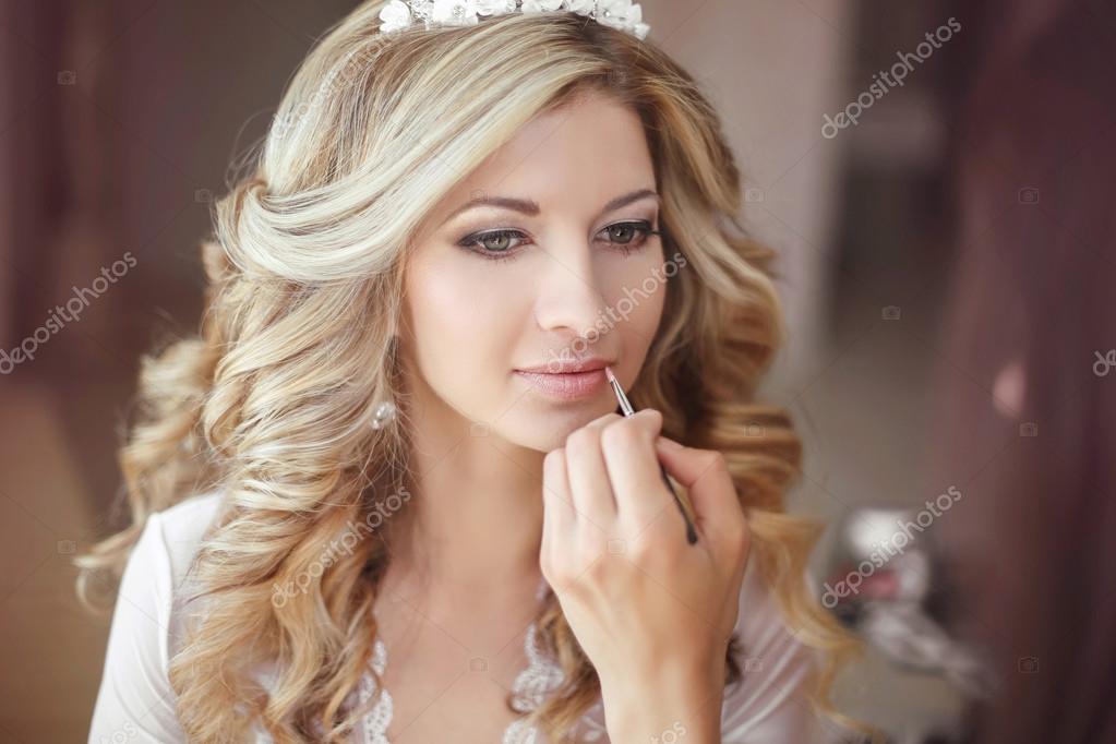 Beautiful bride woman with wedding makeup and hairstyle. Stylist Stock Photo by ©VictoriaAndrea 86044072 Beautiful bride woman with wedding makeup and hairstyle. Stylist Stock Photo by ©VictoriaAndrea 86044072