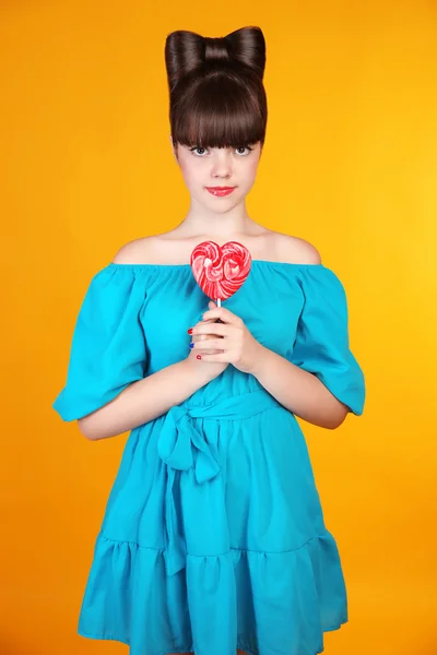 Heart Lollypop. Beautiful teen girl with colourful  lolli pop. F — Stockfoto