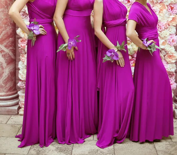 Bridesmaids in purple dresses. Wedding. — Stok fotoğraf