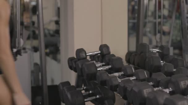 Blonde girl in gym — Stock Video