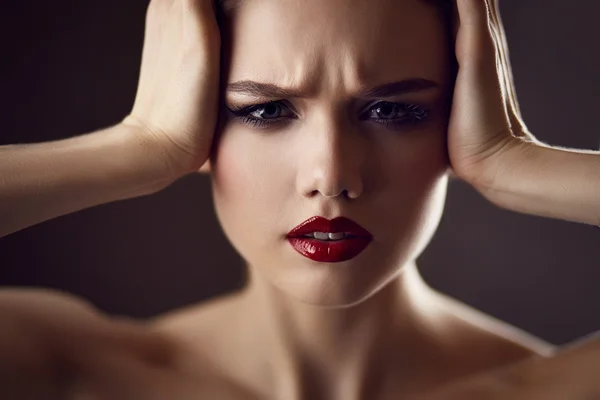 Worried young woman — Stock Photo, Image