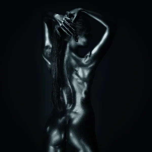 Lady in silver, back posing — Stock Photo, Image