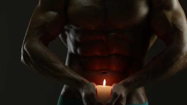 Body and candle — Stock Video