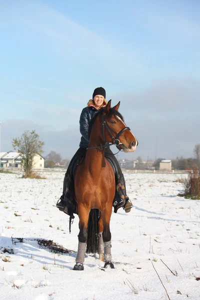 Teenager girl riding bay horse portrait — Stock Photo, Image