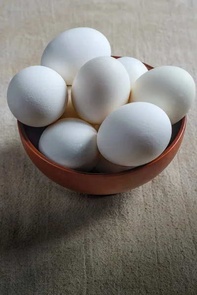 Eggs in the brown Cup — Stock Photo, Image