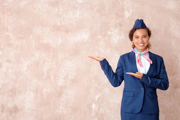 Beautiful African American Stewardess Color Background — Stock Photo, Image