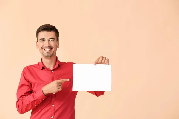 Young Man Blank Paper Sheet Color Background — Stock Photo, Image