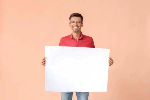 Young Man Blank Paper Sheet Color Background — Stock Photo, Image