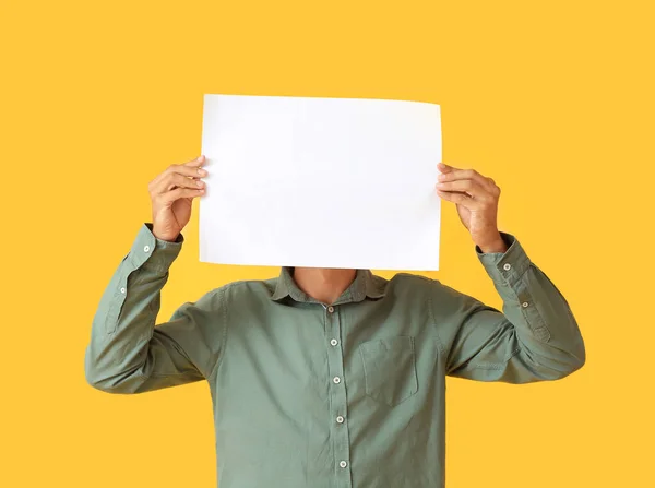 Young Man Blank Paper Sheet Color Background — Stock Photo, Image