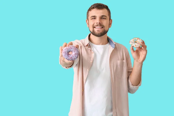 Handsome Young Man Sweet Donuts Color Background — Stock Photo, Image