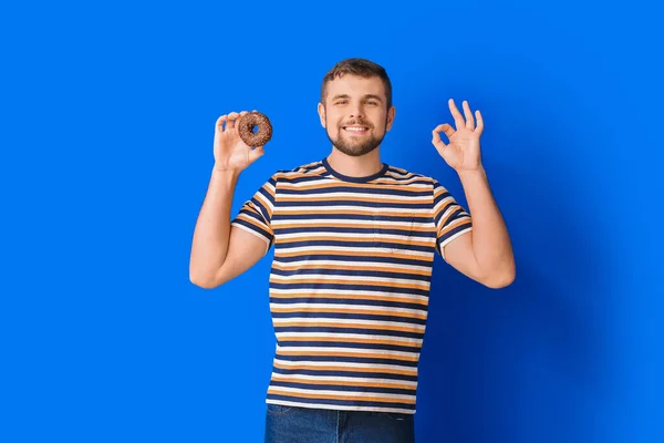 Handsome Young Man Sweet Donut Showing Color Background — Stock Photo, Image