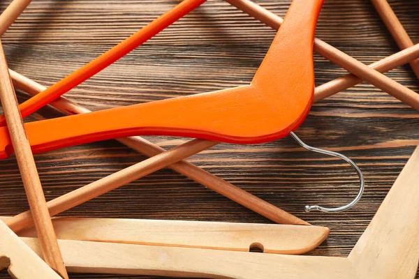 Clothes Hangers Wooden Background — Stock Photo, Image