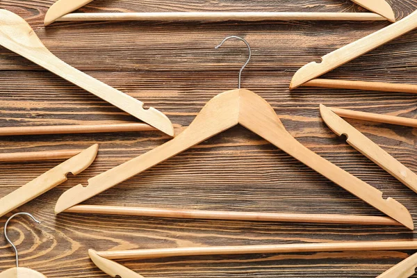 Clothes Hangers Wooden Background — Stock Photo, Image