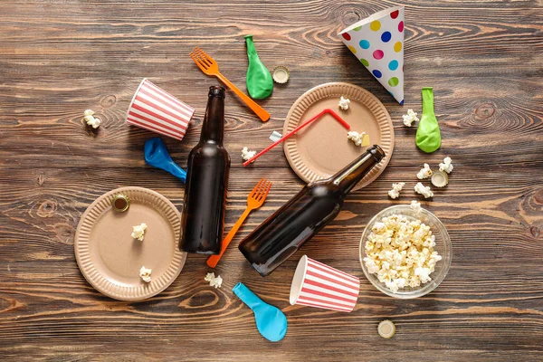 Mess after party celebration on wooden background