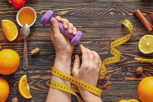 Female Hands Measuring Tape Dumbbell Fresh Products Wooden Background Diet — Stock Photo, Image