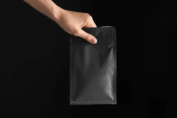 Hand Coffee Bag Dark Background — Stock Photo, Image