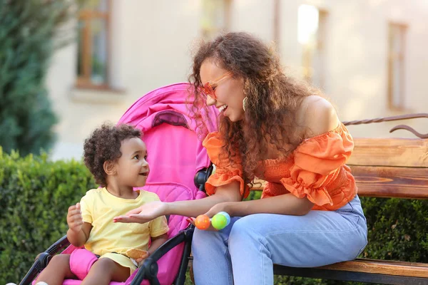 African American Woman Her Cute Baby Stroller Outdoors — Stock Photo, Image