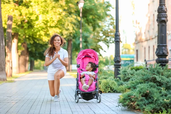 Sporty African American Woman Her Cute Baby Stroller Outdoors — Stock Photo, Image
