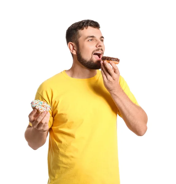 Joven Guapo Con Rosquillas Dulces Sobre Fondo Blanco — Foto de Stock