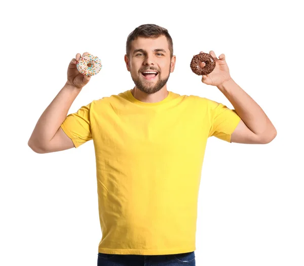 Joven Guapo Con Rosquillas Dulces Sobre Fondo Blanco — Foto de Stock