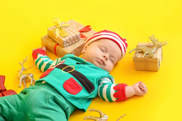 Sleeping Little Baby Elf Costume Christmas Gifts Color Background — Stock Photo, Image