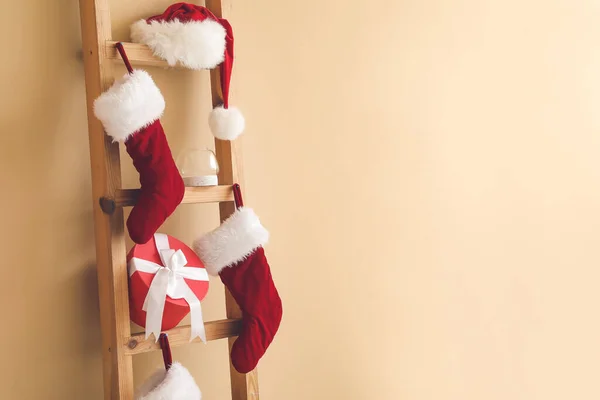 Ladder Christmas Gift Santa Hat Socks Color Wall — Stock Photo, Image