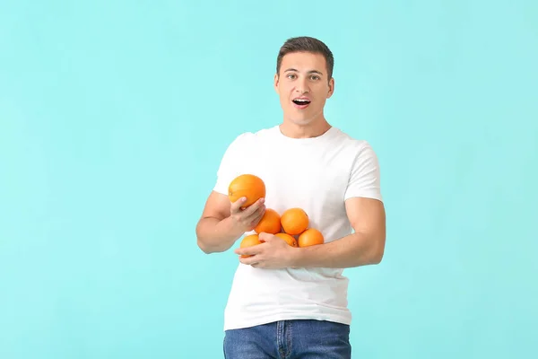 Handsome Man Ripe Oranges Color Background — Stock Photo, Image