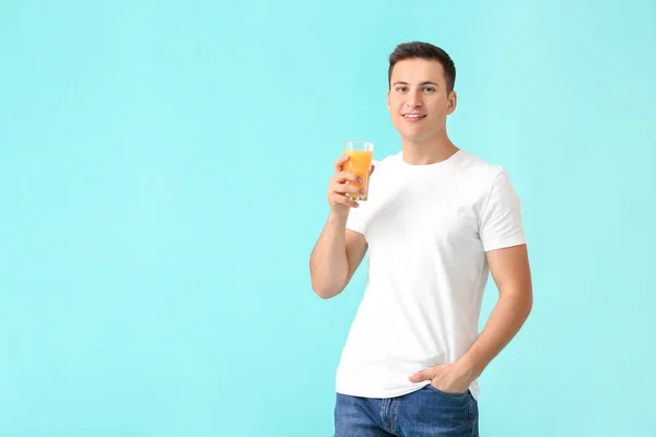 Handsome Man Orange Juice Color Background — Stock Photo, Image