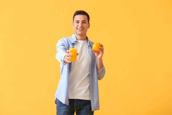 Handsome Man Orange Juice Color Background — Stock Photo, Image