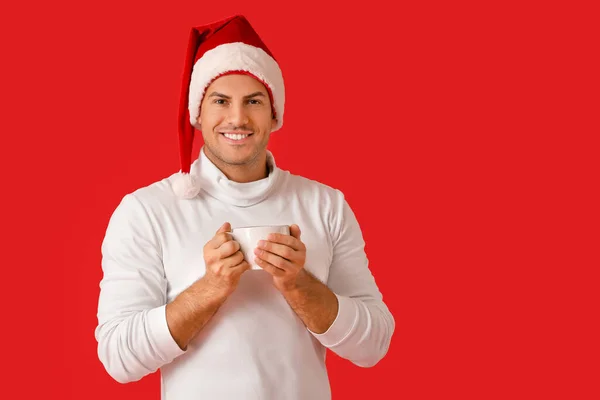 Handsome Young Man Santa Hat Hot Tea Color Background — Stock Photo, Image