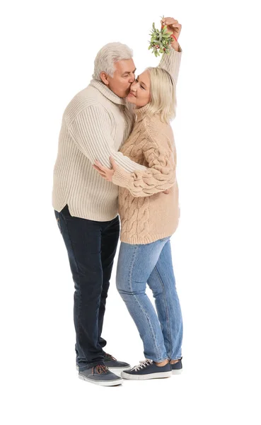 Mature Man Kissing His Wife Mistletoe Branch White Background — Stock Photo, Image
