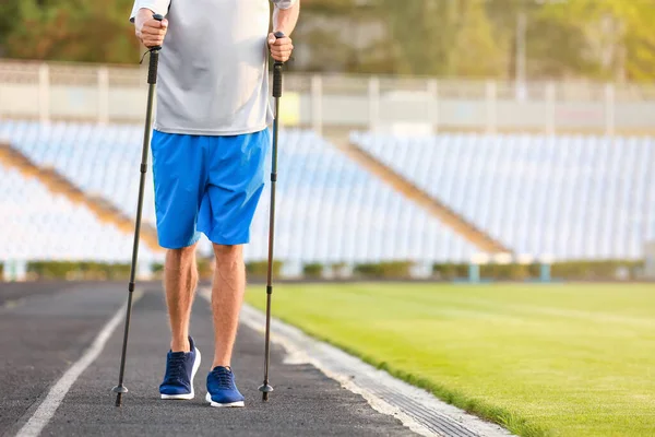 Young Man Training Walking Poles Stadium — Stock Photo, Image