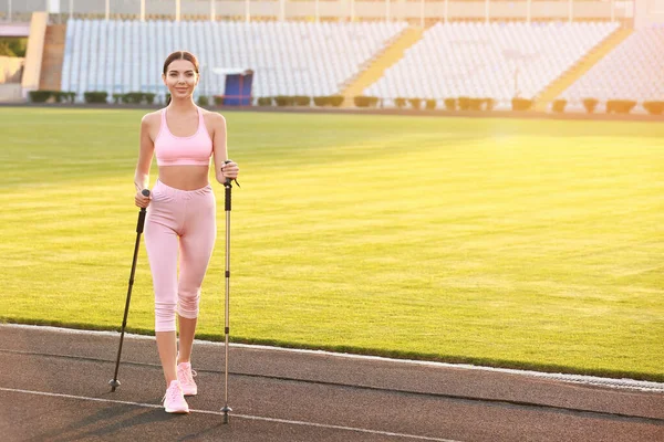 Young Woman Training Walking Poles Stadium — Stock Photo, Image