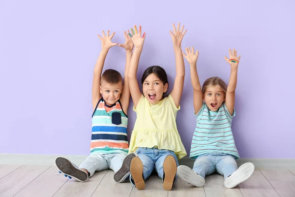 Happy Little Children Sitting Color Wall — Stock Photo, Image