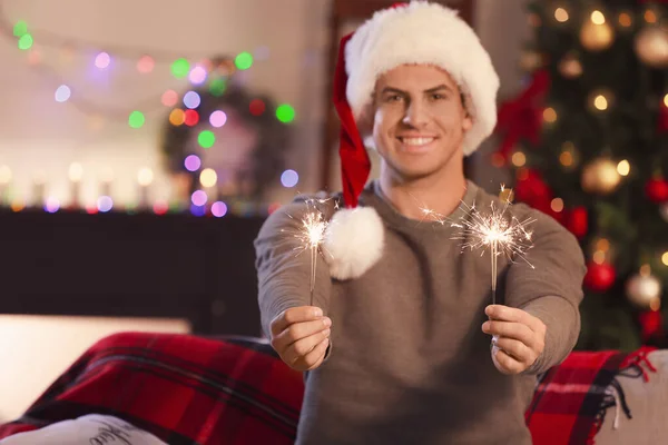 Handsome Young Man Sparklers Celebrating Christmas Home — Stock Photo, Image