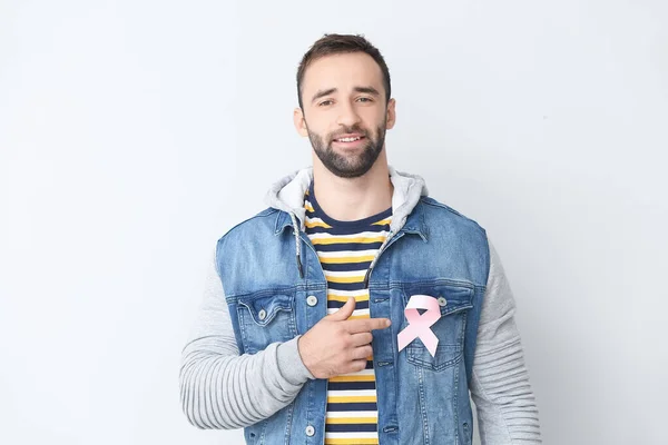 Young Man Pink Ribbon Light Background Breast Cancer Awareness Concept — Stock Photo, Image