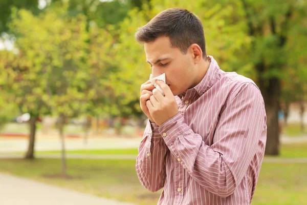 Young Man Suffering Allergy Outdoors — Stock Photo, Image