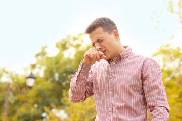 Young Man Suffering Allergy Outdoors — Stock Photo, Image