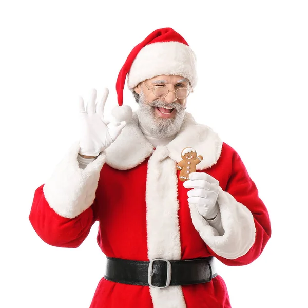 Santa Claus Con Sabrosa Galleta Jengibre Mostrando Sobre Fondo Blanco —  Fotos de Stock
