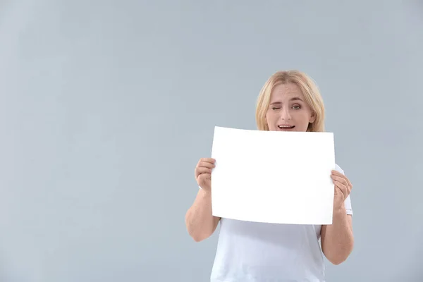 Woman Blank Paper Sheet Grey Background — Stock Photo, Image