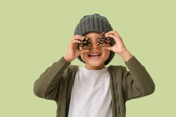 Cute African American Boy Coniferous Cones Color Background — Stock Photo, Image