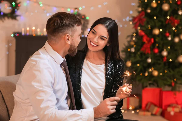 Young Couple Sparklers Celebrating Christmas Home — Stock Photo, Image